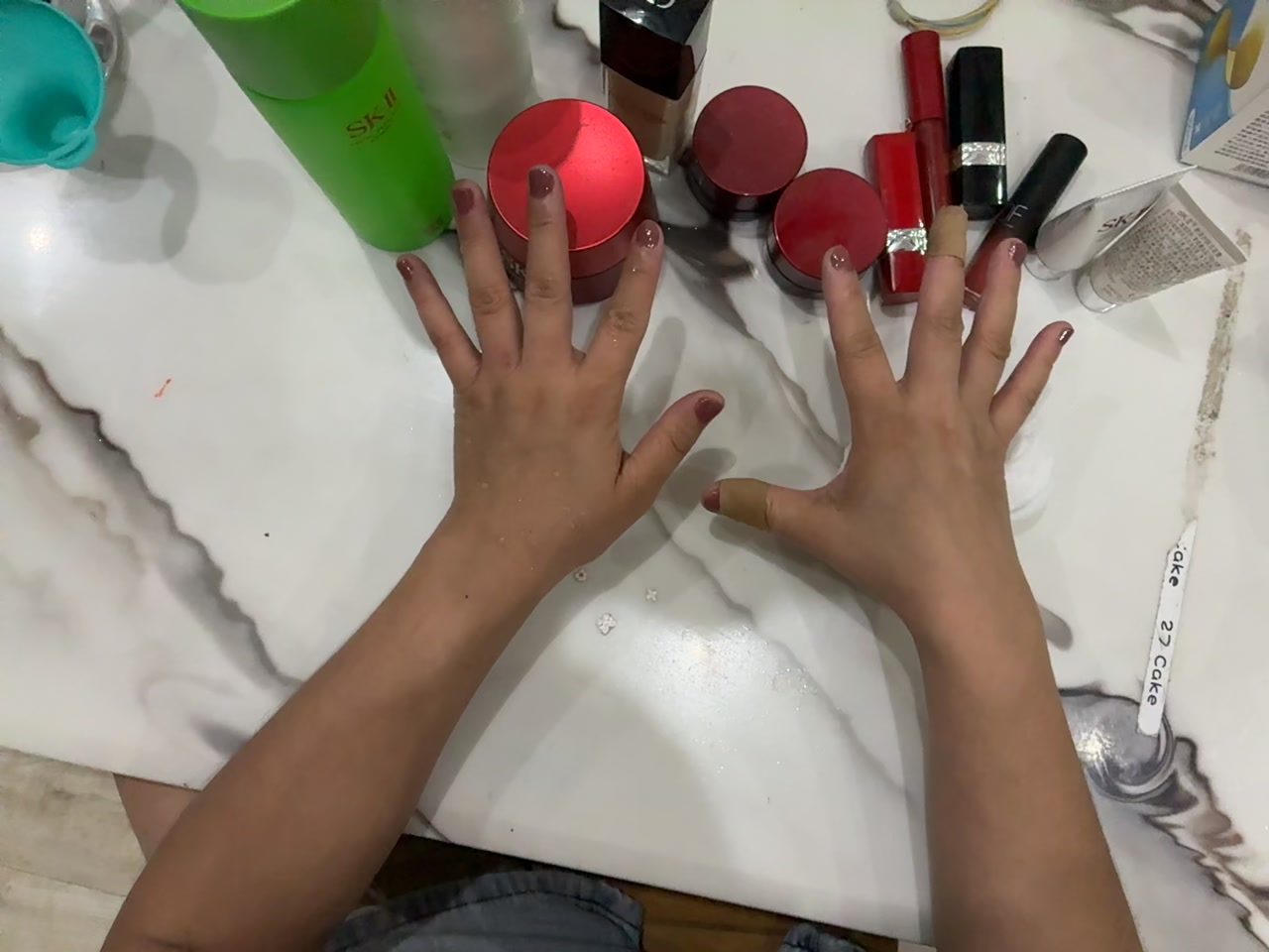 Wiping Cosmetic Bottles first-frame poster